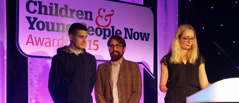 Diagrama volunteer John Yarrow with chief executive David McGuire and BBC presenter Cerrie Burnell at the awards in 2015
