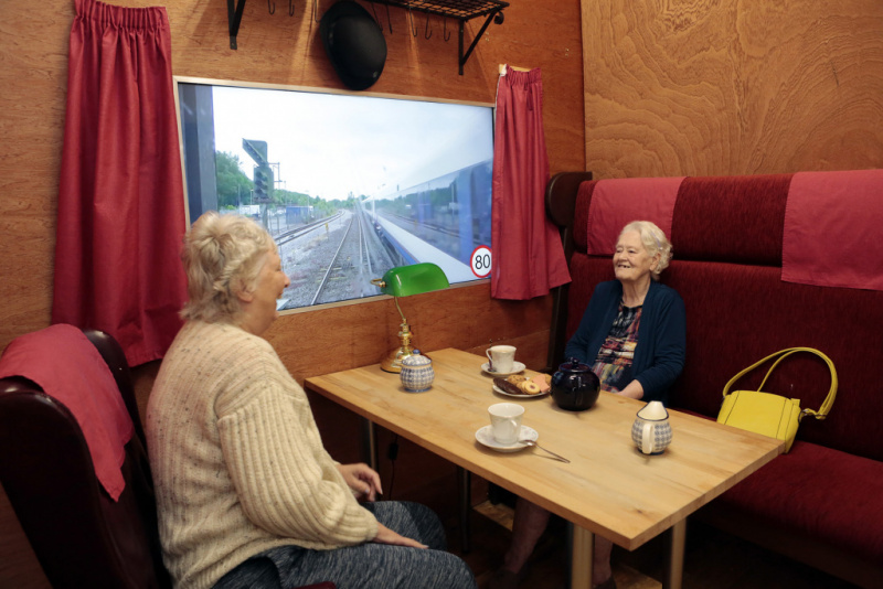 Edensor residents enjoy tea in the new purpose built train carriage at Edensor Care Centre Clacton, Essex